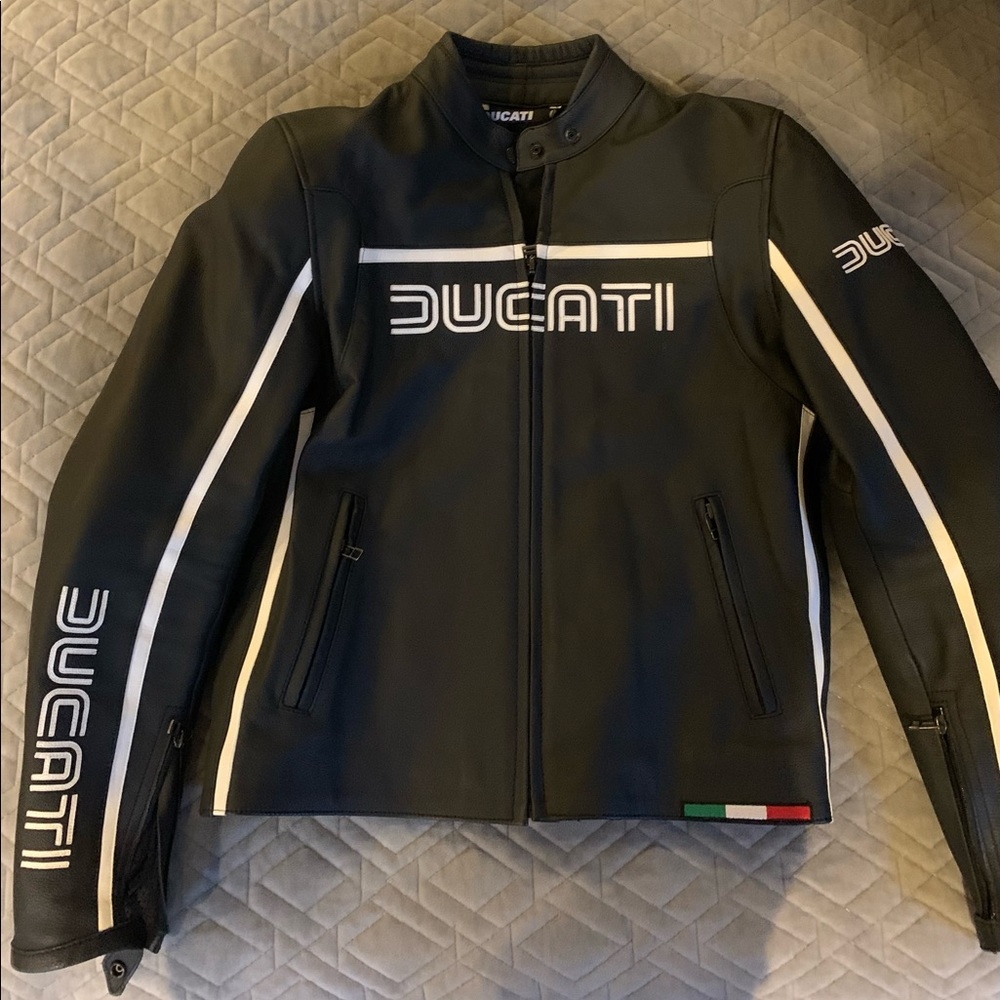 Ducati cowhide racing jacket. Size 46.  Has armor protective inserts.